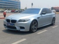 Used 2013 BMW M5 for sale in Abu Dhabi