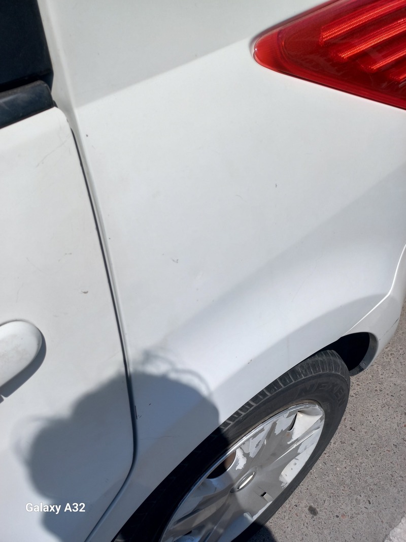 Used 2013 Nissan Tiida for sale in Abu Dhabi