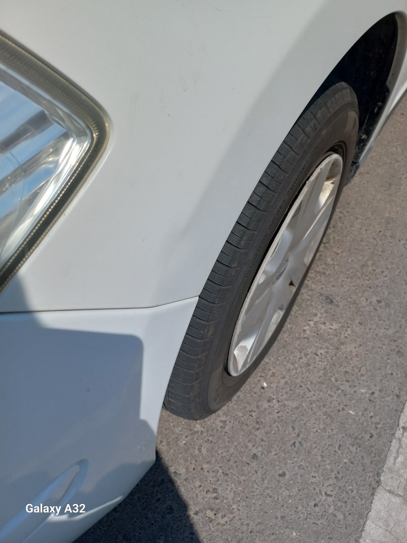 Used 2013 Nissan Tiida for sale in Abu Dhabi